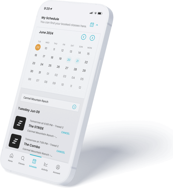 Branded mobile app on a white phone showing a member’s class schedule and upcoming bookings