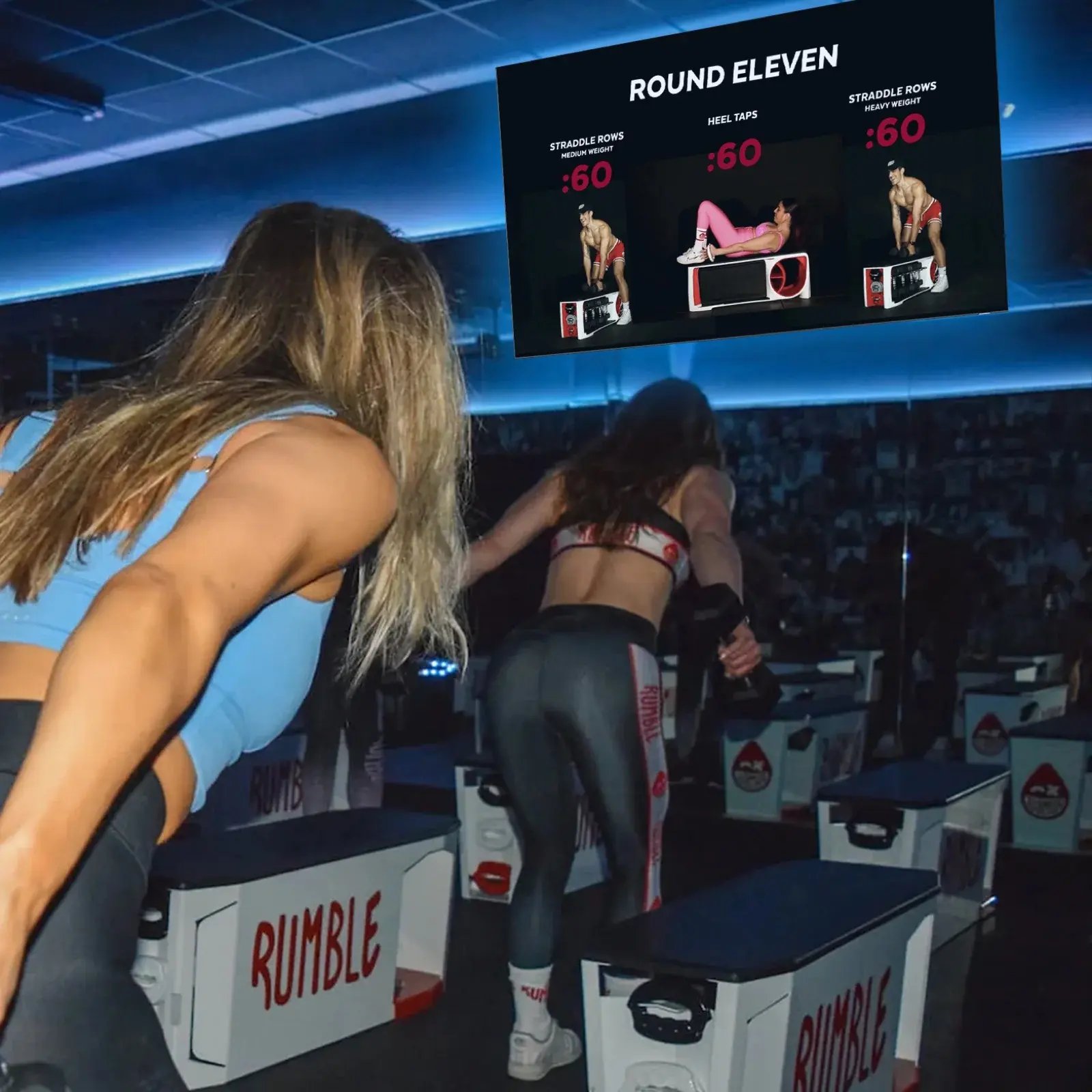 Studio workout screen above members showing movement demonstrations, exercise names, and 60-second intervals